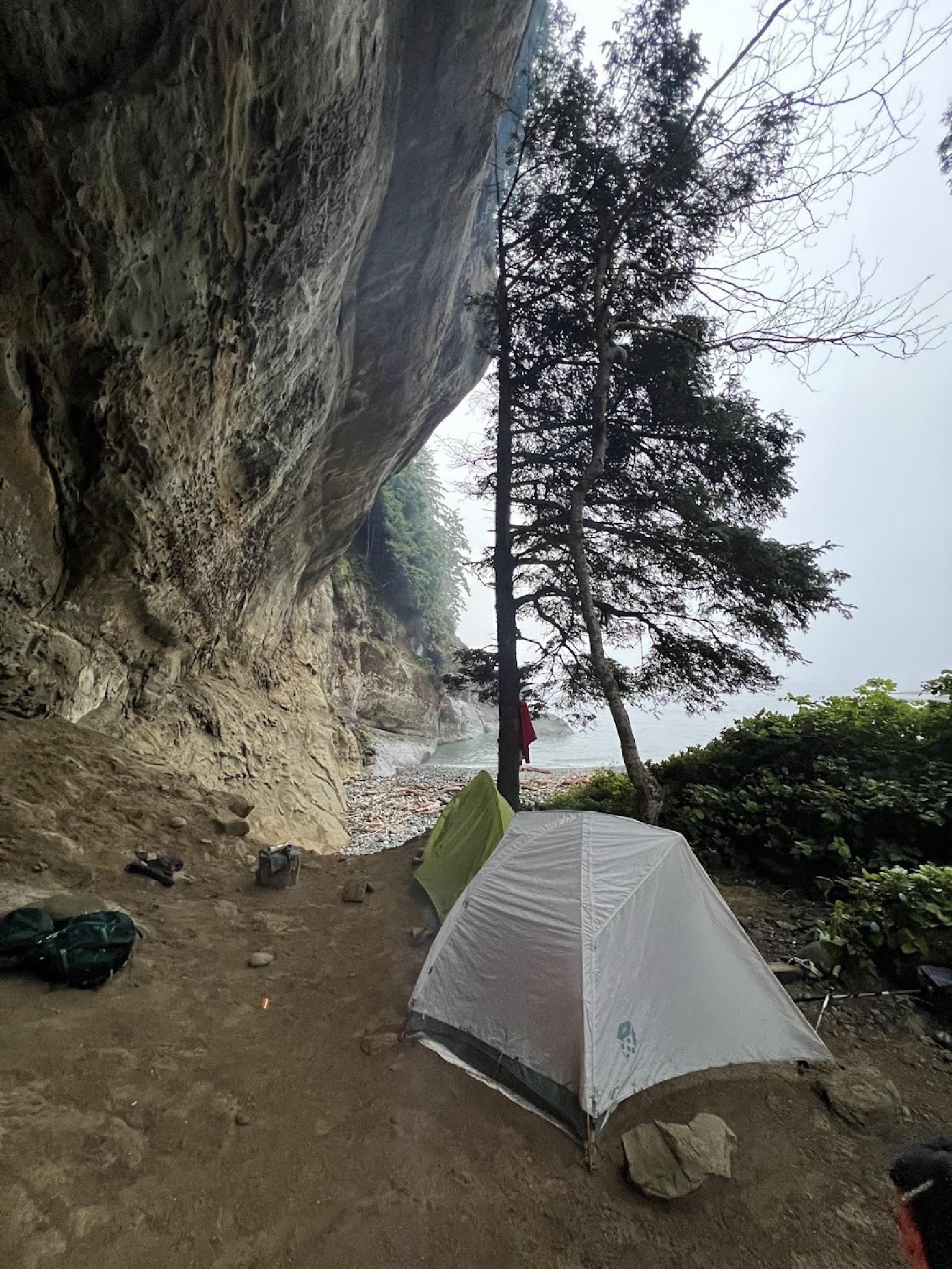 Tents under a cliff