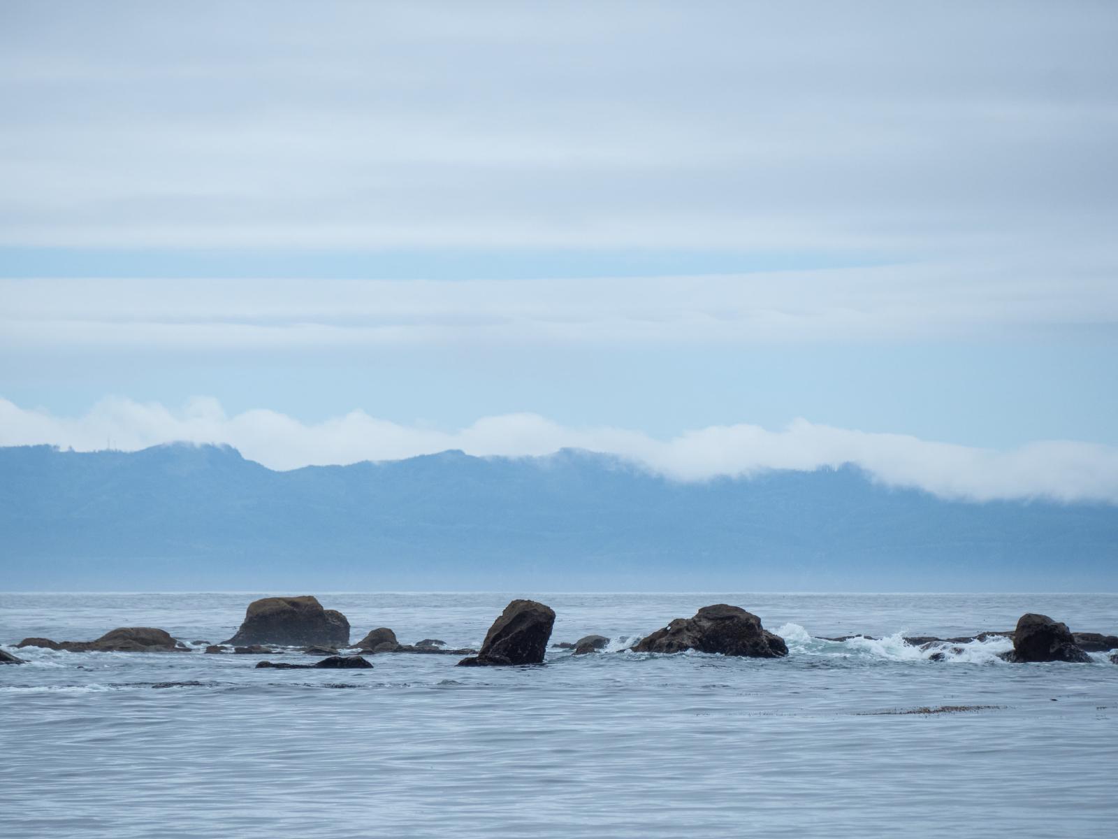 Looking to the US Olympic Mountains from the beachh