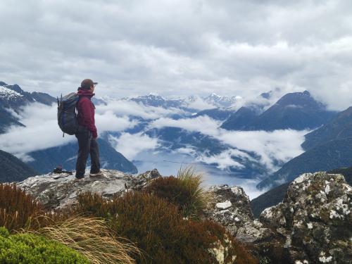 The author standing by an overlook of the fjord