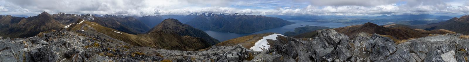 View of the lake and mountains from the Luxmore summit